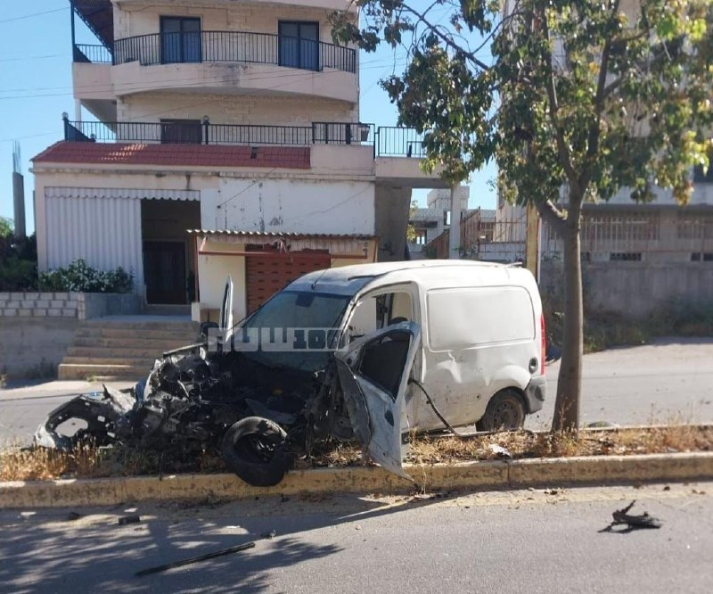 Thumbnail preview image for the video titled: Israeli drone struk and damaged a vehicle in Deir el Zahrani, claiming targeted assassination