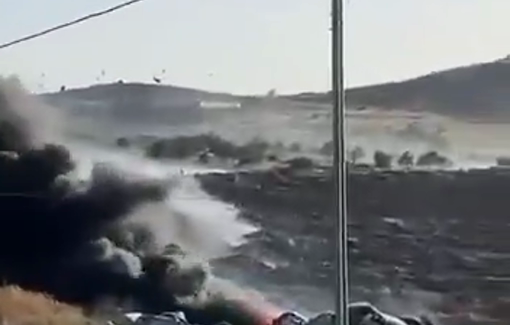 Thumbnail preview image for the video titled: Israeli settlers attack a stadium full of children and set a vehicle on fire in the village of Shuqba