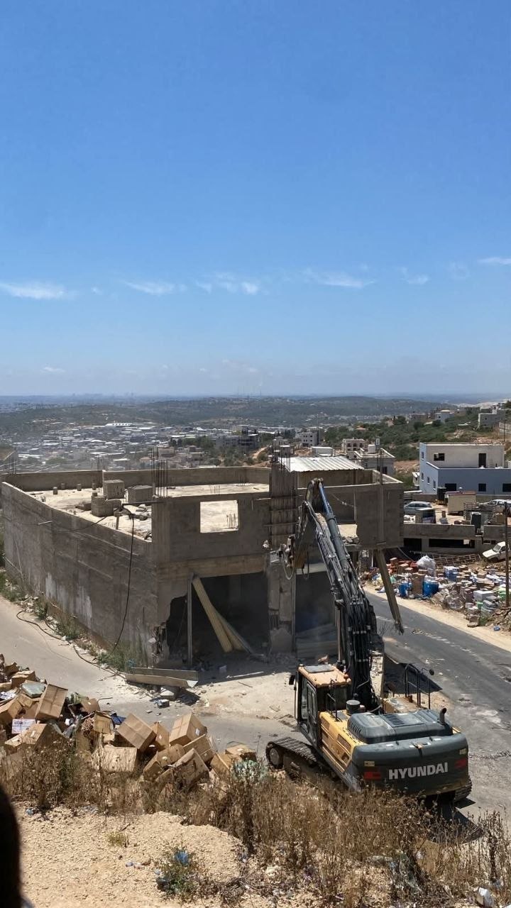 Thumbnail preview image for the video titled: Israeli forces in the process of demolishing several homes in the Palestinian town of Barta’a, which is split down the middle by the 1949 Green Line