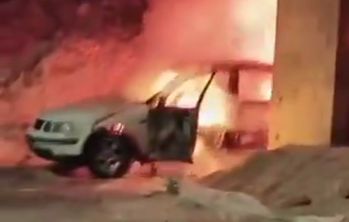 Thumbnail preview image for the video titled: Israeli settlers set fire to several Palestinian vehicles during their attack on the village of Beit Imrin