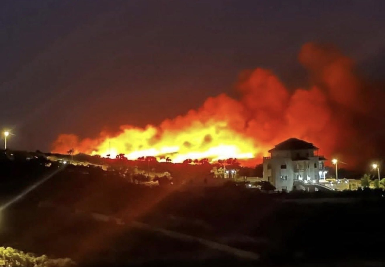 Thumbnail preview image for the video titled: Israeli settlers set fire to a hillside on the outskirts of the Christian village of Taybeh