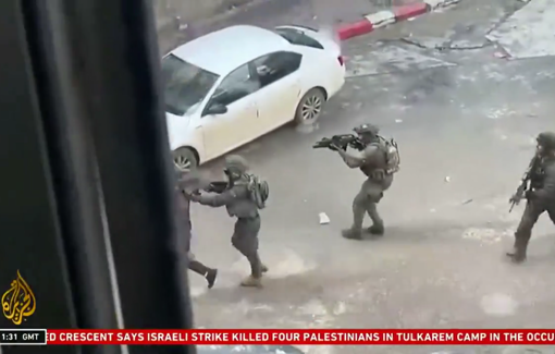 Thumbnail preview image for the video titled: Palestinian shop owner, Baha Abu Ras being used as a human shield by several Israeli soldiers in Dura