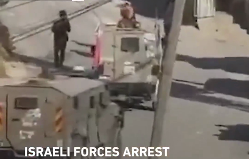 Thumbnail preview image for the video titled: Israeli soldiers using a Palestinian man as a human shield in front of armored vehicle during a raid in al-Fawwar camp