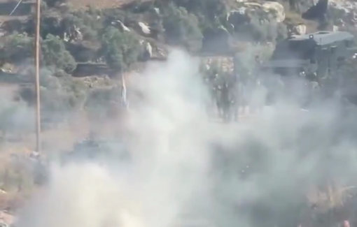 Thumbnail preview image for the video titled: A Palestinian civilian injured in the head after being targeted with a gas grenade fired by Israeli forces during a peaceful anti-settlement march