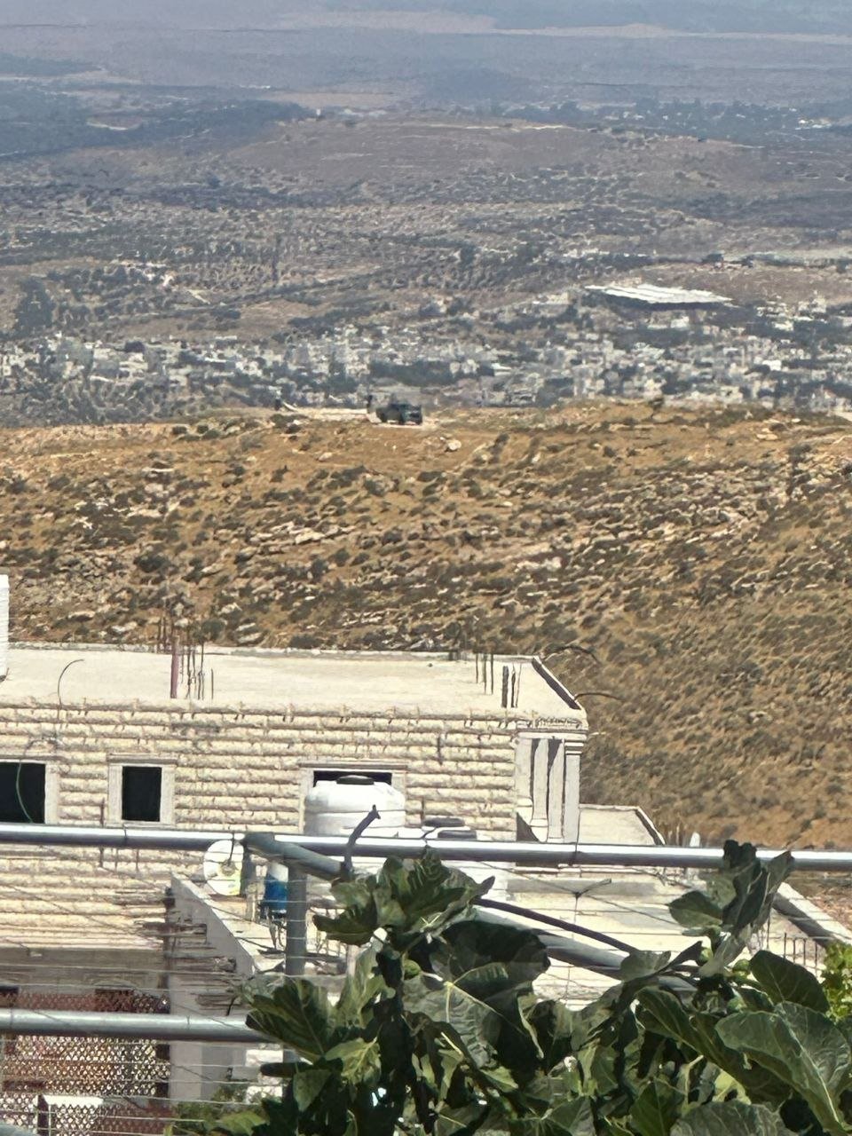 Thumbnail preview image for the video titled: Israeli settlers, backed by soldiers, have erected a colonial tent on the summit of Jabal Tarousa