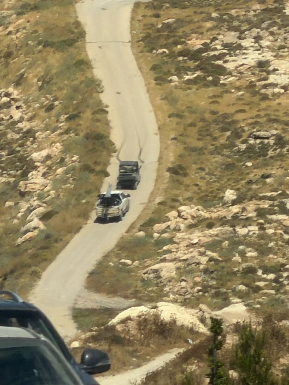 Thumbnail preview image for the video titled: Israeli settlers, backed by soldiers, have erected a colonial tent on the summit of Jabal Tarousa