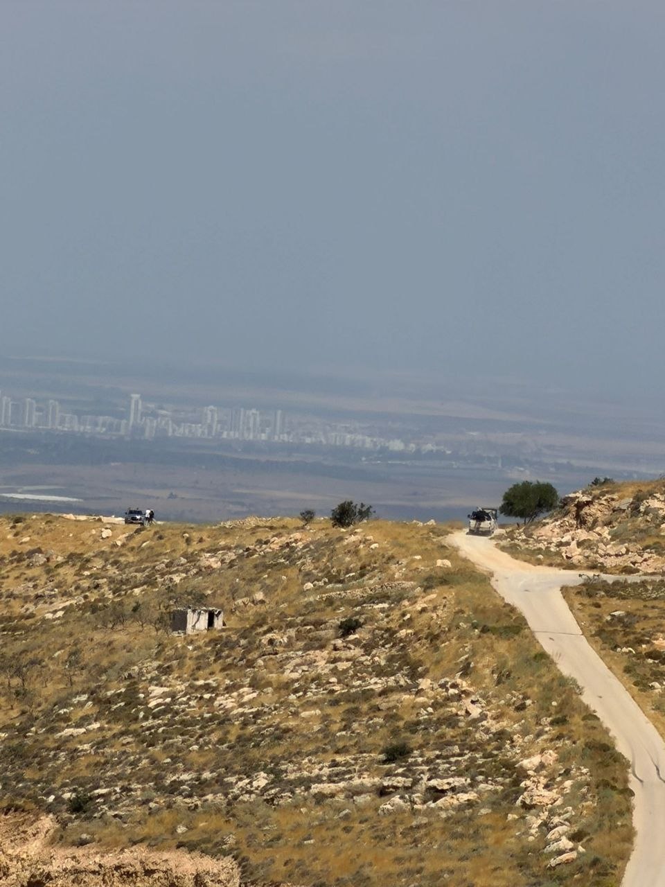 Thumbnail preview image for the video titled: Israeli settlers, backed by soldiers, have erected a colonial tent on the summit of Jabal Tarousa