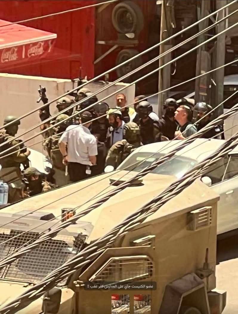 Thumbnail preview image for the video titled: Israeli lawmaker Zvi Sukkot, under heavy police protection, stormed the area around Palestinian schools in Kafr Aqab