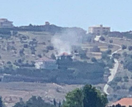 Thumbnail preview image for the video titled: In Haddatha, Bint Jbeil region, Israeli invaders are burning civilian houses