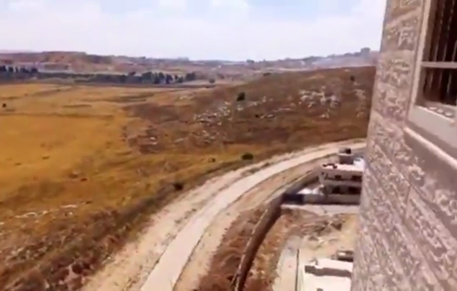 Thumbnail preview image for the video titled: Israeli bulldozers razed Palestinian-owned lands in the town of Kafr Aqab in northern occupied Jerusalem