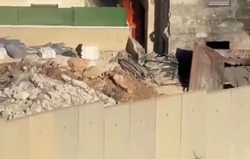 Thumbnail preview image for the video titled: A fire broke out after Israeli forces fired tear gas bombs against residents and homes in the town of Kafr Aqab