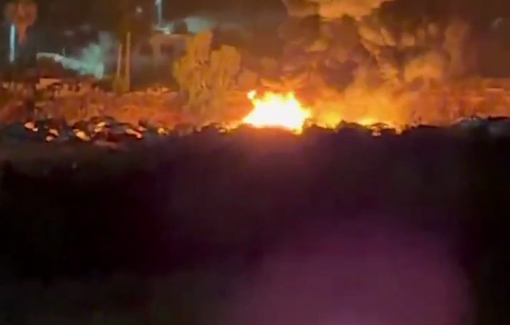 Thumbnail preview image for the video titled: Settlers set fire to a vehicle graveyard in Shuqba, and the blaze spread across large areas