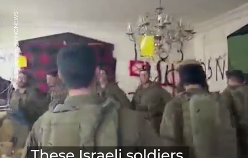 Thumbnail preview image for the video titled: Israeli soldiers celebrate the completion of a religious study inside a Lebanese home they occupy and have damaged