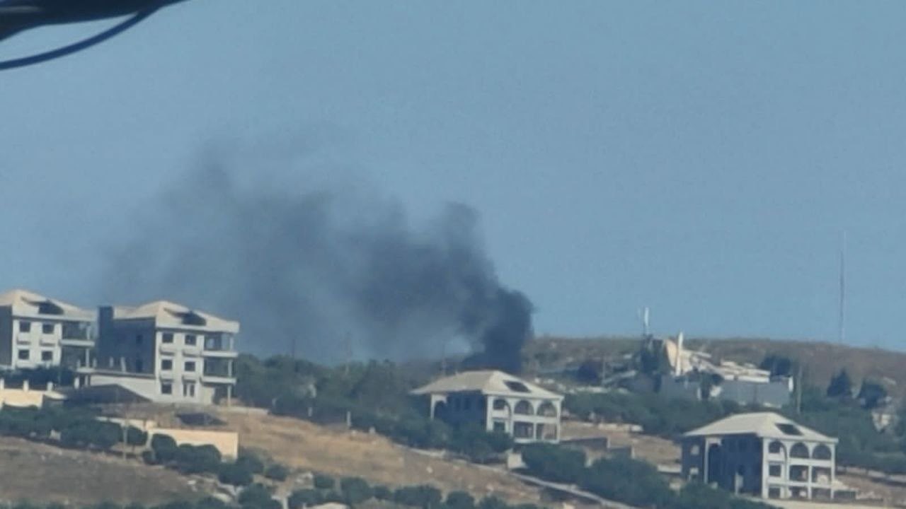 Thumbnail preview image for the video titled: Two people were killed in an Israeli bombing of a vehicle in the Douha area of Kfar Remman, southern Lebanon.