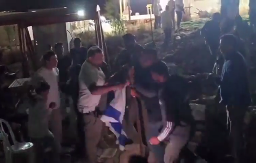 Thumbnail preview image for the video titled: Israeli settlers, backed by Israeli forces, attempting to raise an Israeli flag in the heart of the village of Umm al-Khair