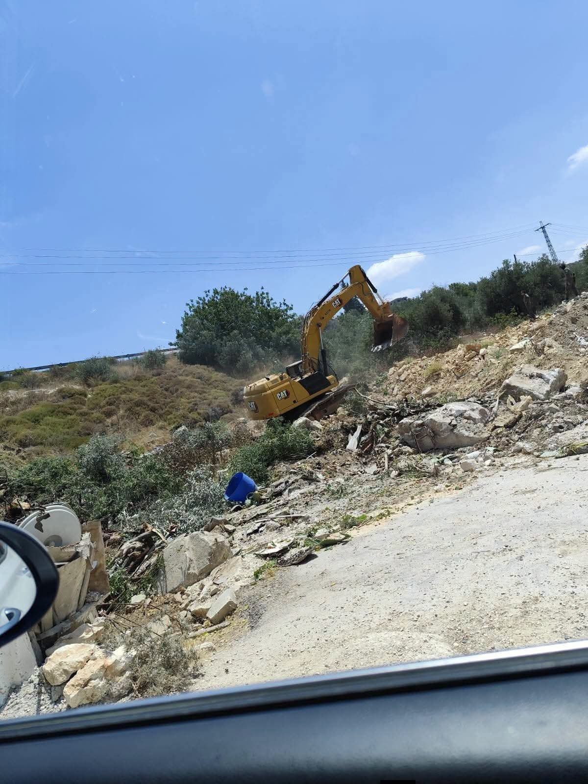 Thumbnail preview image for the video titled: Israeli forces bulldozed land and uprooted olive trees in the village of Madama, south of Nablus