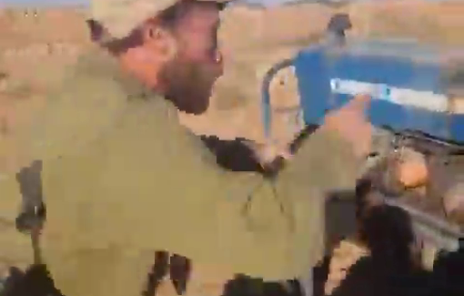 Thumbnail preview image for the video titled: Israeli settler wearing soldier uniform attacked Palestinian farmers while they are plowing their land in Huwarah