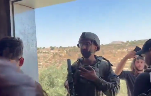 Thumbnail preview image for the video titled: Backed by soldiers, Israeli settlers attacked solidarity activists attempting to repair damage to a house in Jurish