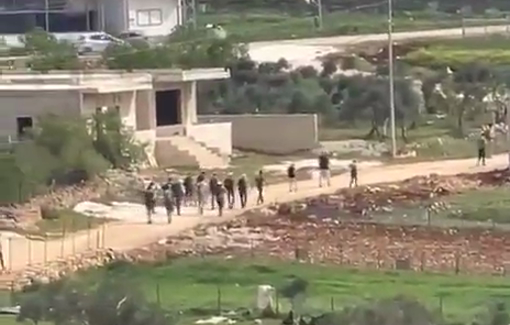 Thumbnail preview image for the video titled: Israeli settlers, backed by Israeli forces, storm the area between Qabalan and Jurish