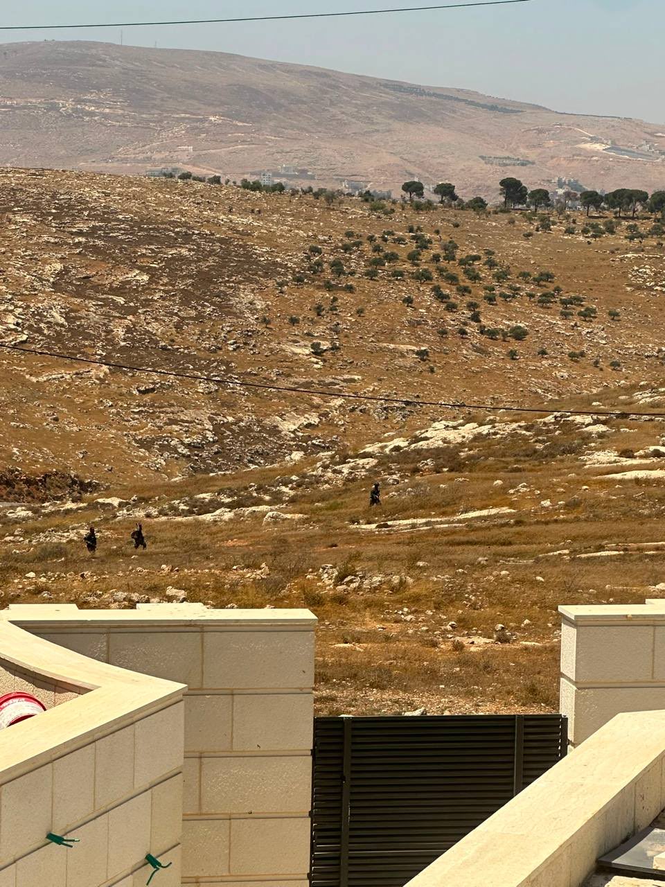Thumbnail preview image for the video titled: A view of Israeli soldiers deployed in the town of Beit Furik, during the ongoing settler attack