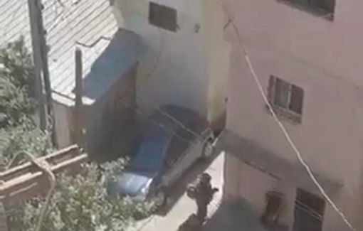 Thumbnail preview image for the video titled: Israeli forces terrorize and detain a Palestinian from Jerusalem during their ongoing raid on Qalandiya