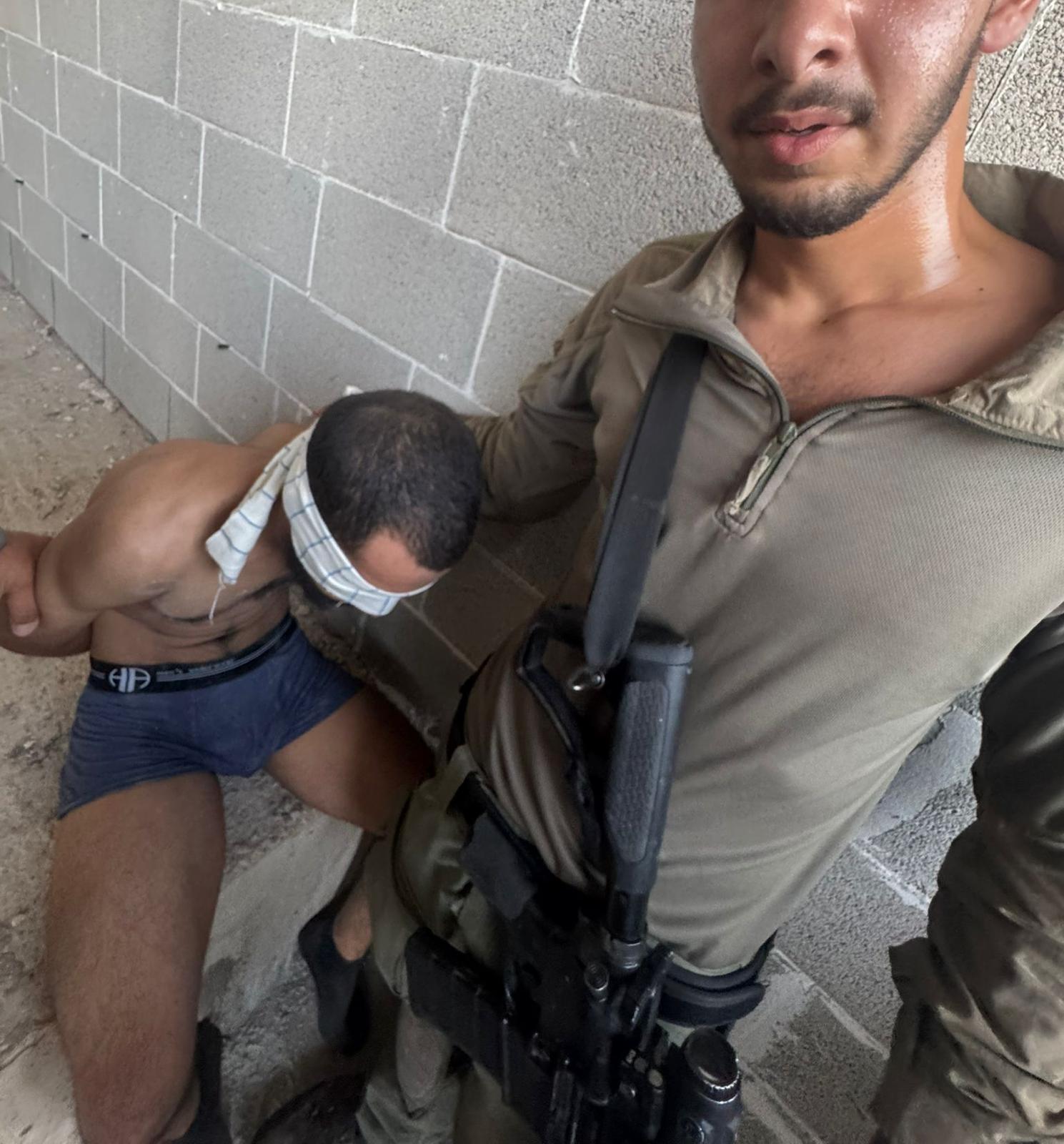 Thumbnail preview image for the video titled: Israeli police officers taking a selfie with a stripped Palestinian detainee