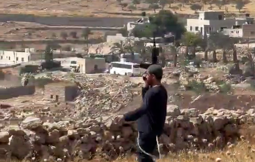 Thumbnail preview image for the video titled: An armed settler shot in direction of activist and journalists in Beit Sahour during a peaceful operation
