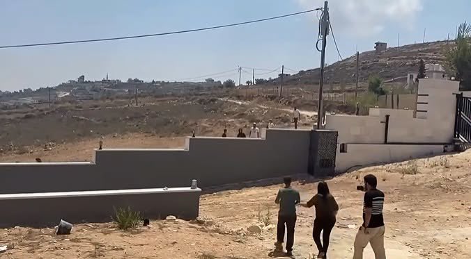 Thumbnail preview image for the video titled: Israeli settlers, backed by soldiers, continue to besiege the homes of the Abu Rida and Hassan families in Qusra