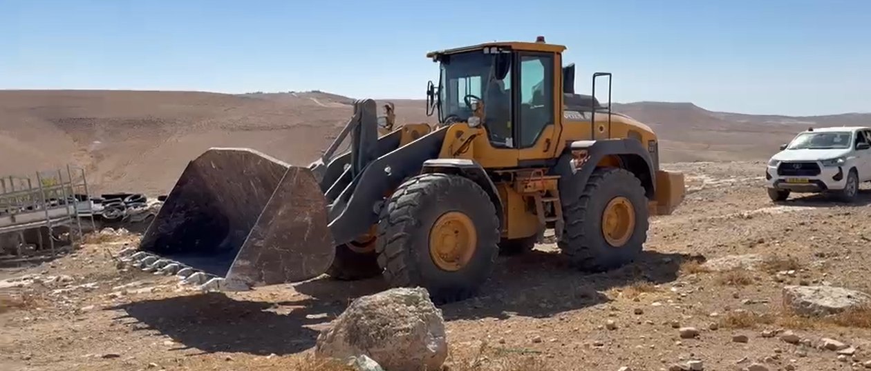 Thumbnail preview image for the video titled: Additional machinery that took part in the demolition in Khirbet at Taban: a JCB backhoe and a Caterpillar loader
