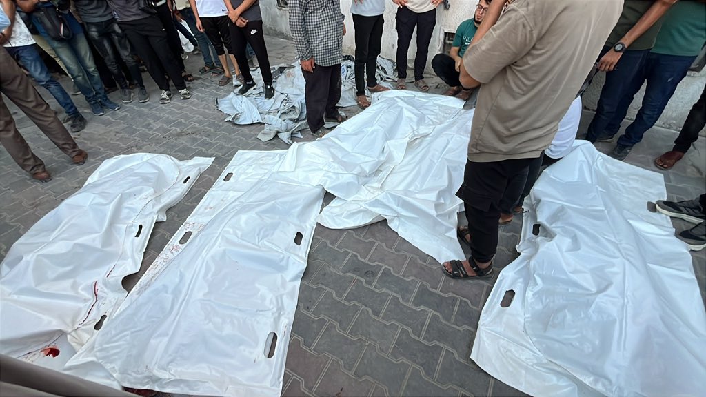 Thumbnail preview image for the video titled: Bodies of Palestinians killed in Israeli bombing of Gaza Port cafe