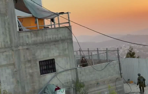Thumbnail preview image for the video titled: Israeli soldier standing inside the besieged house in Qusra to Kusai Abu Ridi - “I am the owner”