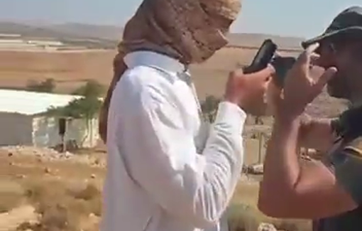 Thumbnail preview image for the video titled: Israeli settler intimidate local Palestinian citizens after raiding the Bedouin community of Arab Al-Kaabneh near Taybeh