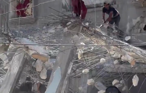 Thumbnail preview image for the video titled: Young men clear rubble of destroyed home in Gaza