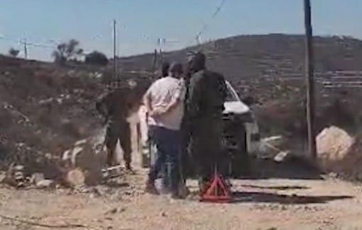 Thumbnail preview image for the video titled: MK Ofer Cassif violently prevented to reach one of the besieged Qusra home