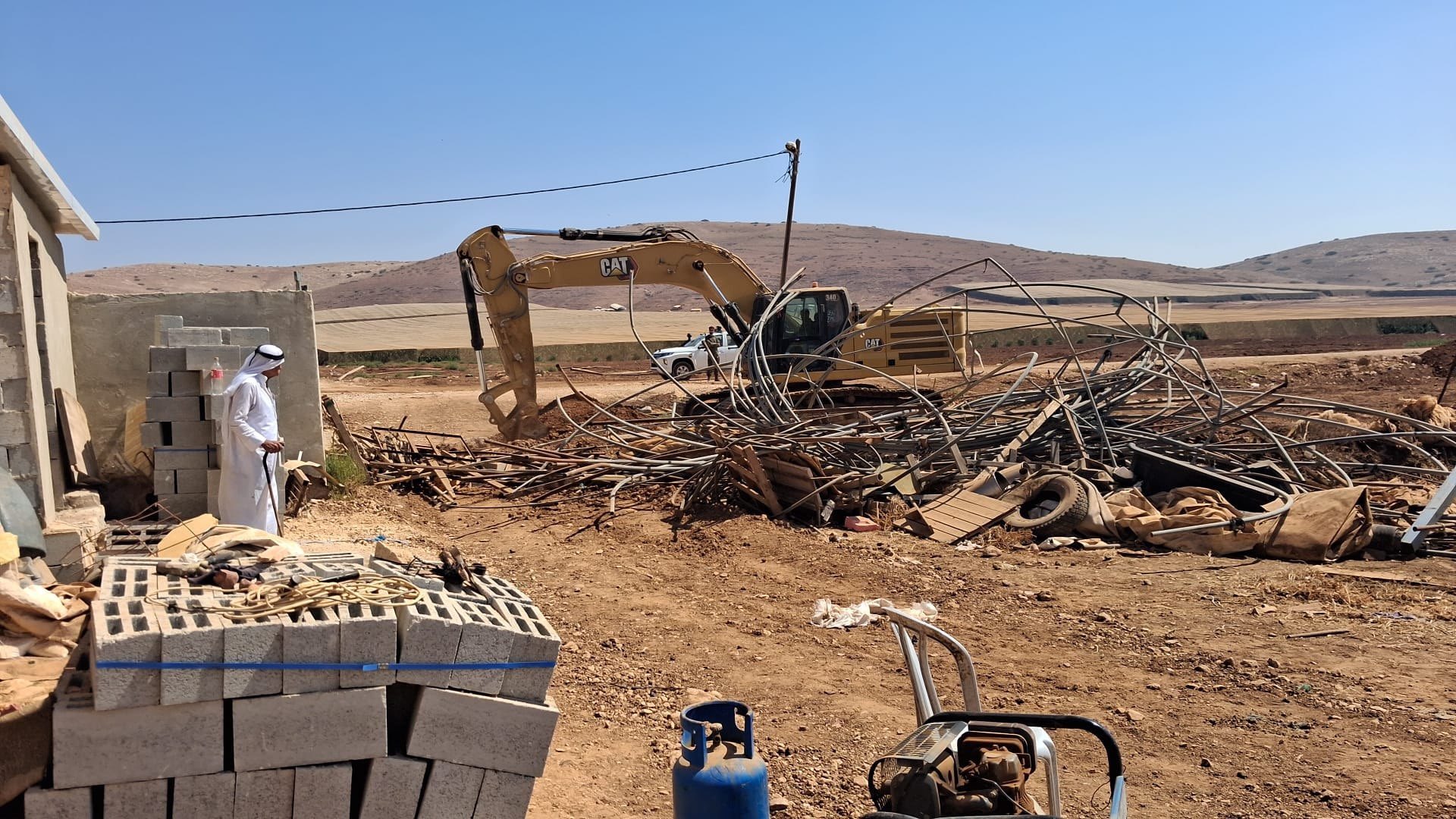 Thumbnail preview image for the video titled: Israeli forces demolished Palestinian homes, agricultural structures, and artesian wells during a military raid on Atouf and Al-Ras Al-Ahmar