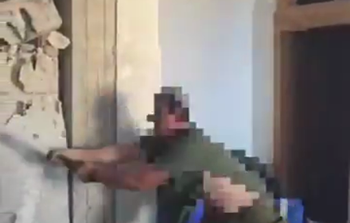 Thumbnail preview image for the video titled: A Israeli soldier in religious attire demolishes a Lebanese house with a hammer