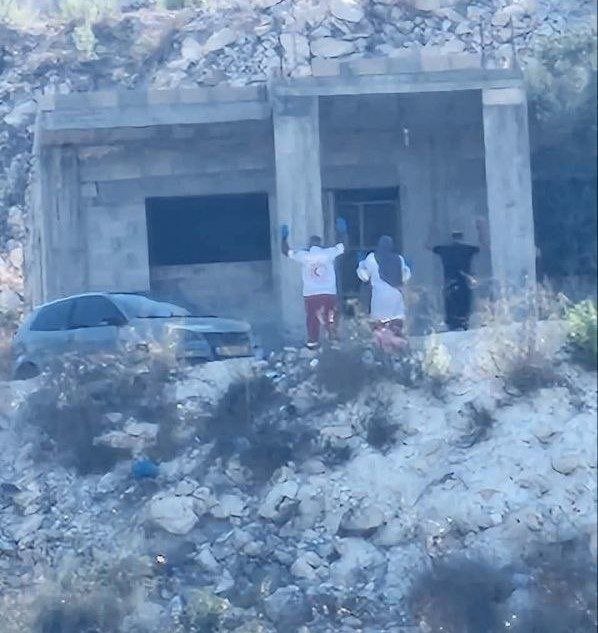 Thumbnail preview image for the video titled: PCRS crews arrested in front of the bombed building in the Harsh al-Saada area of Jenin City