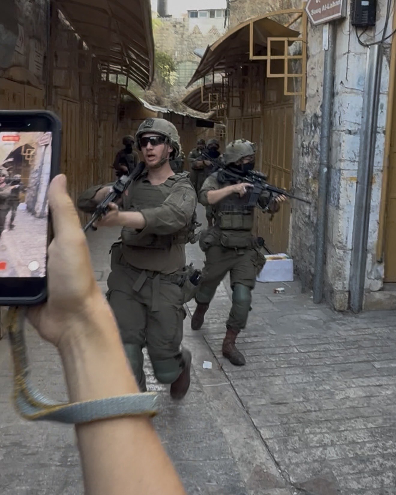 Thumbnail preview image for the video titled: What Palestinians in Hebron’s Old City endure every Shabbat during settler marches
