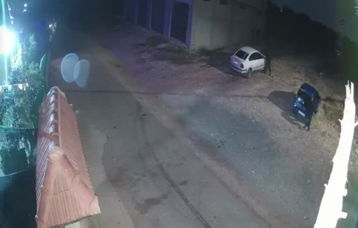 Thumbnail preview image for the video titled: Settlers pour fuel over two vehicles next to a building in Beita, set them on fire, and flee