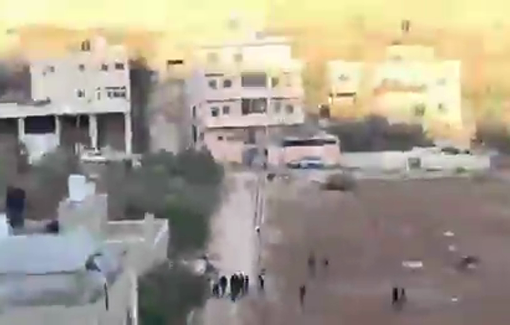 Thumbnail preview image for the video titled: Israeli settlers attacking Palestinian homes in the village of Al-Mughayyir, storming private property