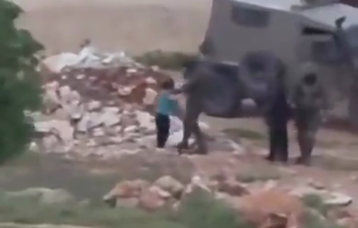 Thumbnail preview image for the video titled: Israeli soldiers harassing two children in Al-Mughayyir
