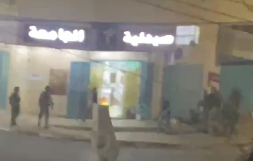 Thumbnail preview image for the video titled: Settler pointing heavy weapon to Palestinian civilians during a coordinated attack in Hajjah,