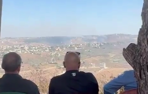 Thumbnail preview image for the video titled: A group of displaced neighbors gather to watch the destruction of their village, Hadatha, every day