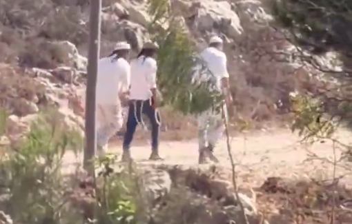 Thumbnail preview image for the video titled: In Qusra, Jewish settlers blow shofars at an army checkpoint as soldiers join the Rosh Hashanah ceremony