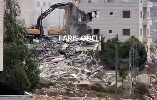 Thumbnail preview image for the video titled: Two residential buildings were destroyed in the Al-Taawun neighborhood of Nablus