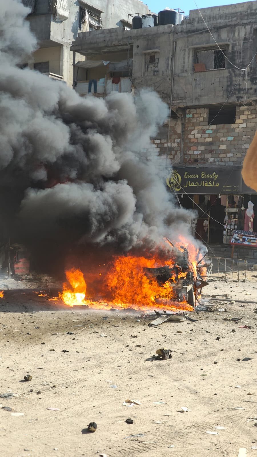 Thumbnail preview image for the video titled: Car ablaze following an Israeli drone strike in Sheikh Rawan