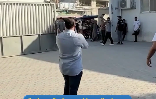 Thumbnail preview image for the video titled: Charred body of car driver brought to hospital after Israel bombed his car