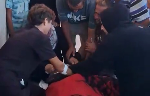 Thumbnail preview image for the video titled: Family mourns woman killed by Israeli gunfire in central Gaza