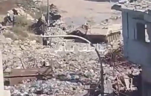 Thumbnail preview image for the video titled: Israeli UGV breaches the Yellow Line entering Al-Sanafour intersection on Salah al-Din Street