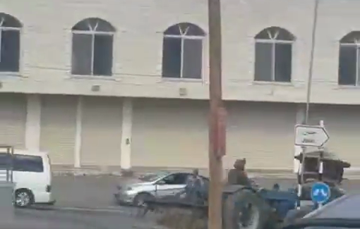 Thumbnail preview image for the video titled: Israeli soldiers steal a Palestinian farmer's tractor at the entrance to the town of Jaba'